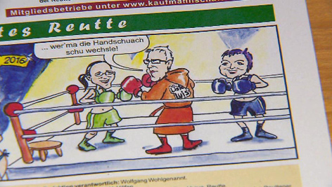 Karikatur zum Gemeinderatswahlkampf in Reutte mit Mann gegen zwei Frauen in Boxring